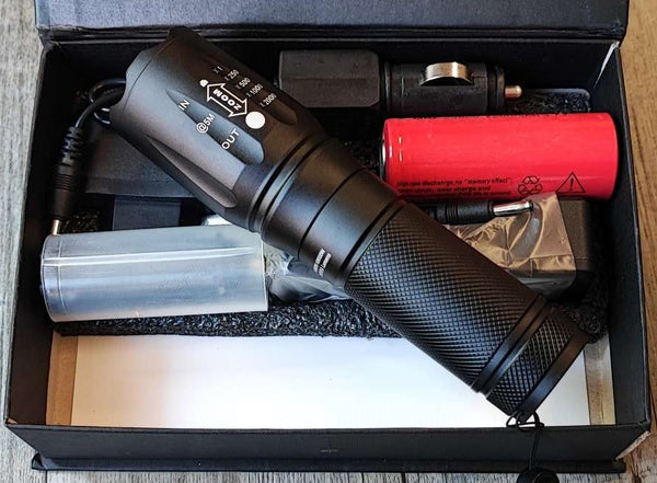 X900 Rechargeable Adjustable Zoom Lithium Battery Powerful LED Torch Kit - Versatile and Reliable Flashlight for Outdoor Activities and Emergencies.