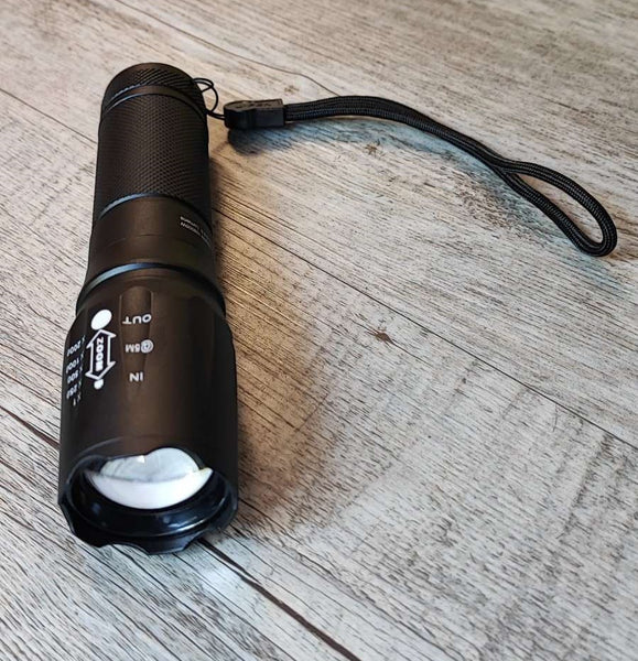 X900 Rechargeable Adjustable Zoom Lithium Battery Powerful LED Torch Kit - Versatile and Reliable Flashlight for Outdoor Activities and Emergencies.