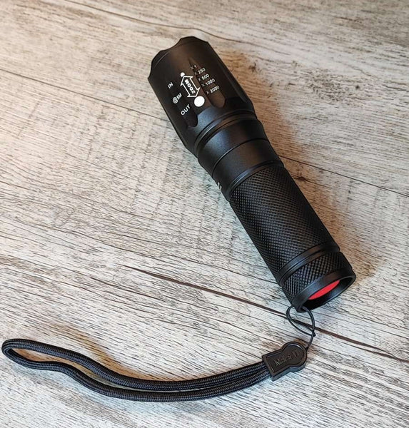 X900 Rechargeable Adjustable Zoom Lithium Battery Powerful LED Torch Kit - Versatile and Reliable Flashlight for Outdoor Activities and Emergencies.