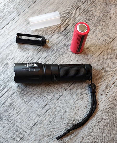 X900 Rechargeable Adjustable Zoom Lithium Battery Powerful LED Torch Kit - Versatile and Reliable Flashlight for Outdoor Activities and Emergencies.