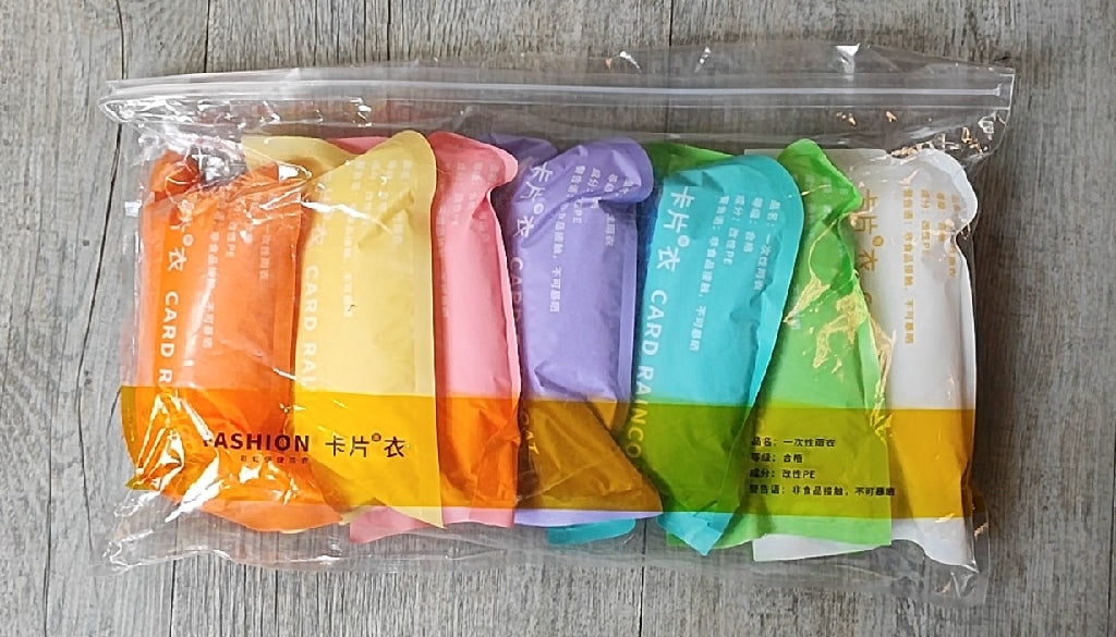 7Pack 1Piece Portable Disposable Multi-Color Travel Raincoat Set - Electromann SA