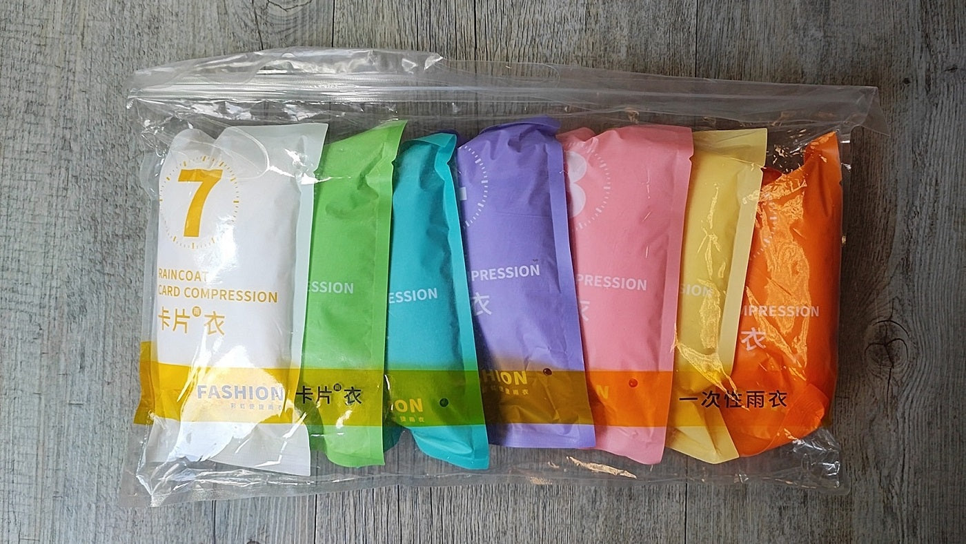 7Pack 1Piece Portable Disposable Multi-Color Travel Raincoat Set - Electromann SA