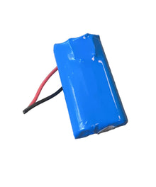 Blue battery pack on a wooden surface